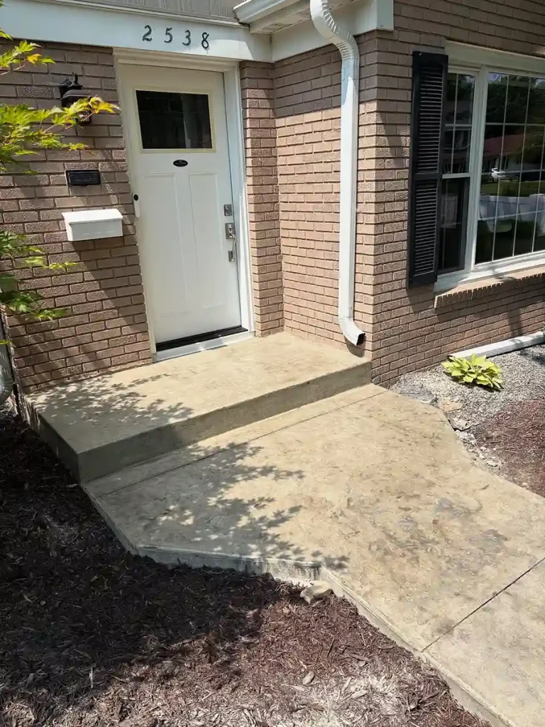 Sidewalk up to porch